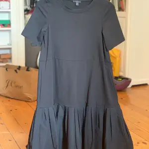 Gathered panel cotton dress in black. Unused!  NEW