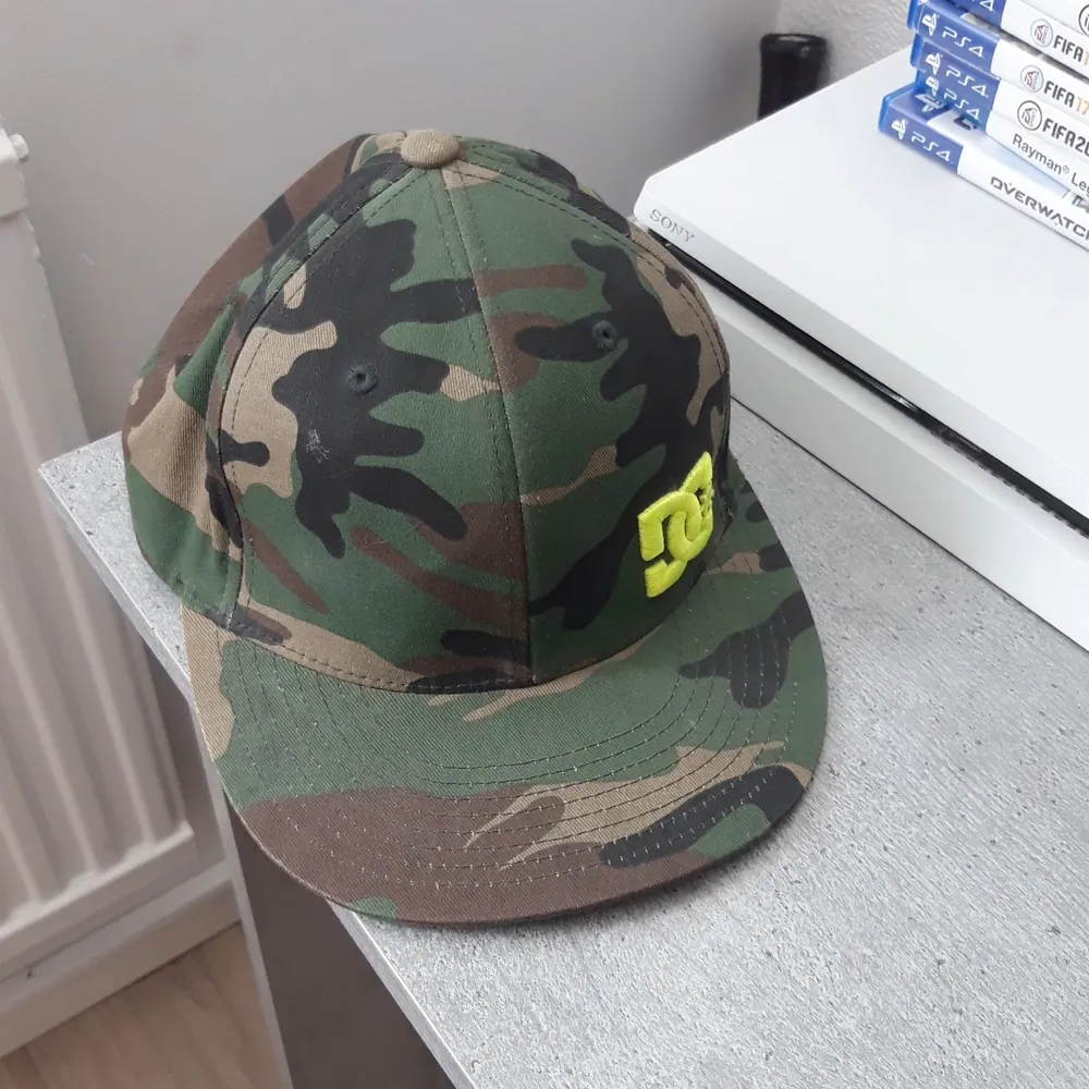 Camo keps. Accessoarer.