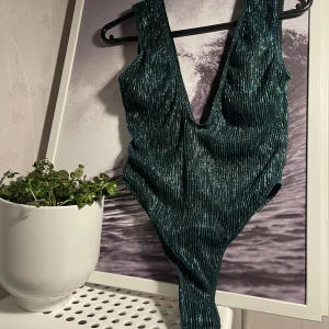 New Bathing suit  - Never worn, new bathing suit from shein. New condition. lovely glittery colour. Payer stands for shipping 😇