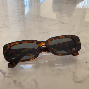 Solglasögon  - Solglasögon perfekta för sommaren  