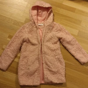 Nanitas for girl size 12 - Second hand. Pink sweater for girl size 12.
