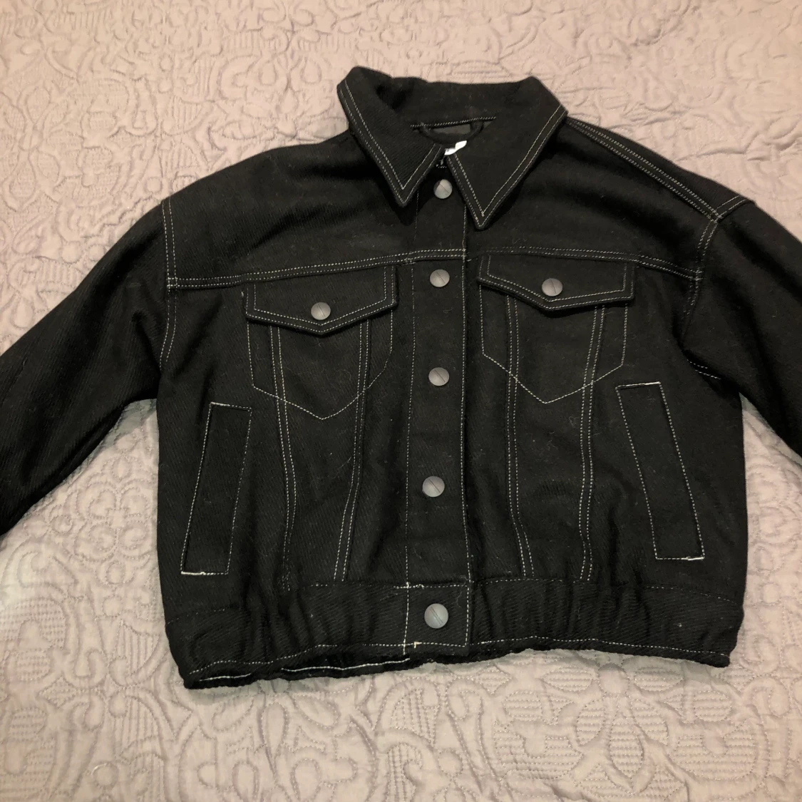 svart  jacka storlek XS