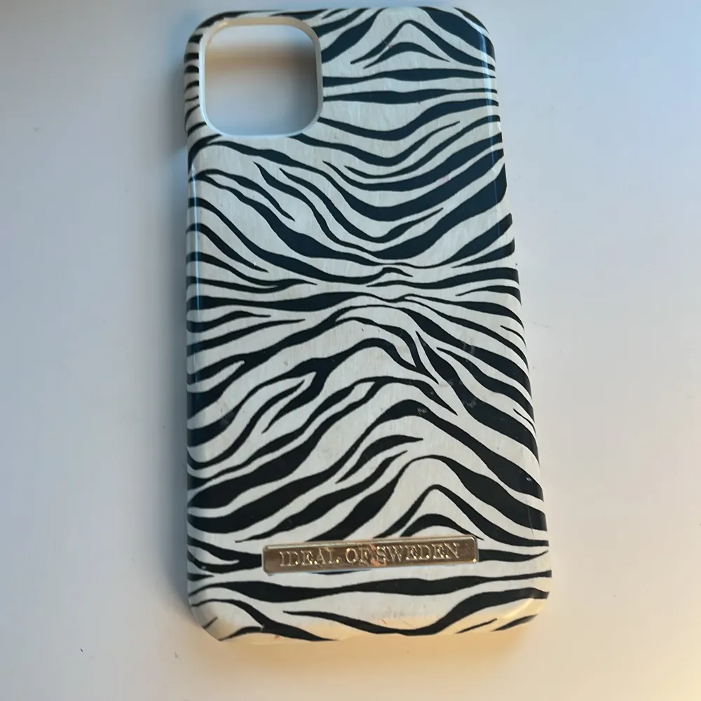 Ett zebra skal av ideal of sweden till iPhone 11. Övrigt.