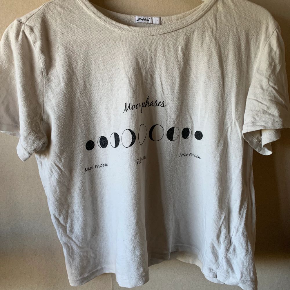 White crop top size s from urban outfitters with graphic . T-shirts.