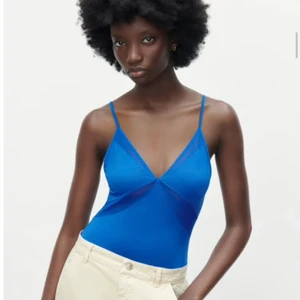 Blå body - Blå body i tunt material. Så fin och endast använd 1 gång