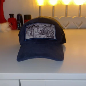 MAGGIORE keps - Säljer min maggiore keps påsen får du med på köpet.