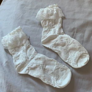 Strumpor  - Oanvända strumpor med spets