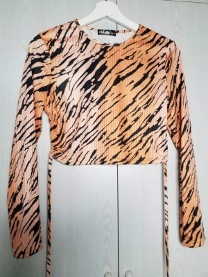 Magtröja  - Magtröja med öppenrygg 