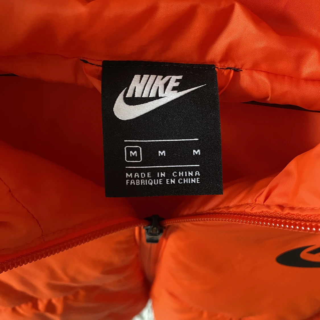 Orange Nike dunjacka - 91