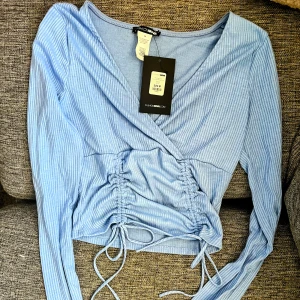 Top - Top från fashionova. Oanvänd med prislapp kvar 