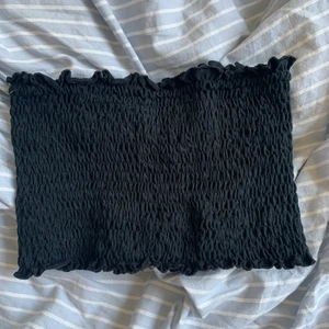 Svart topp - Aldrig använd. Fin topp 