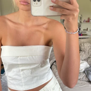 Bandeau topp - Jättefin topp som tyvärr är lite stor för mig som har XS, skulle rekommendera för dig som har stl S-M!! Aldrig använd, är många intresserade blir de budgivning annars först till kvarn!