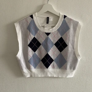 Pullover - Nytt och oanvänd pullover väst. 