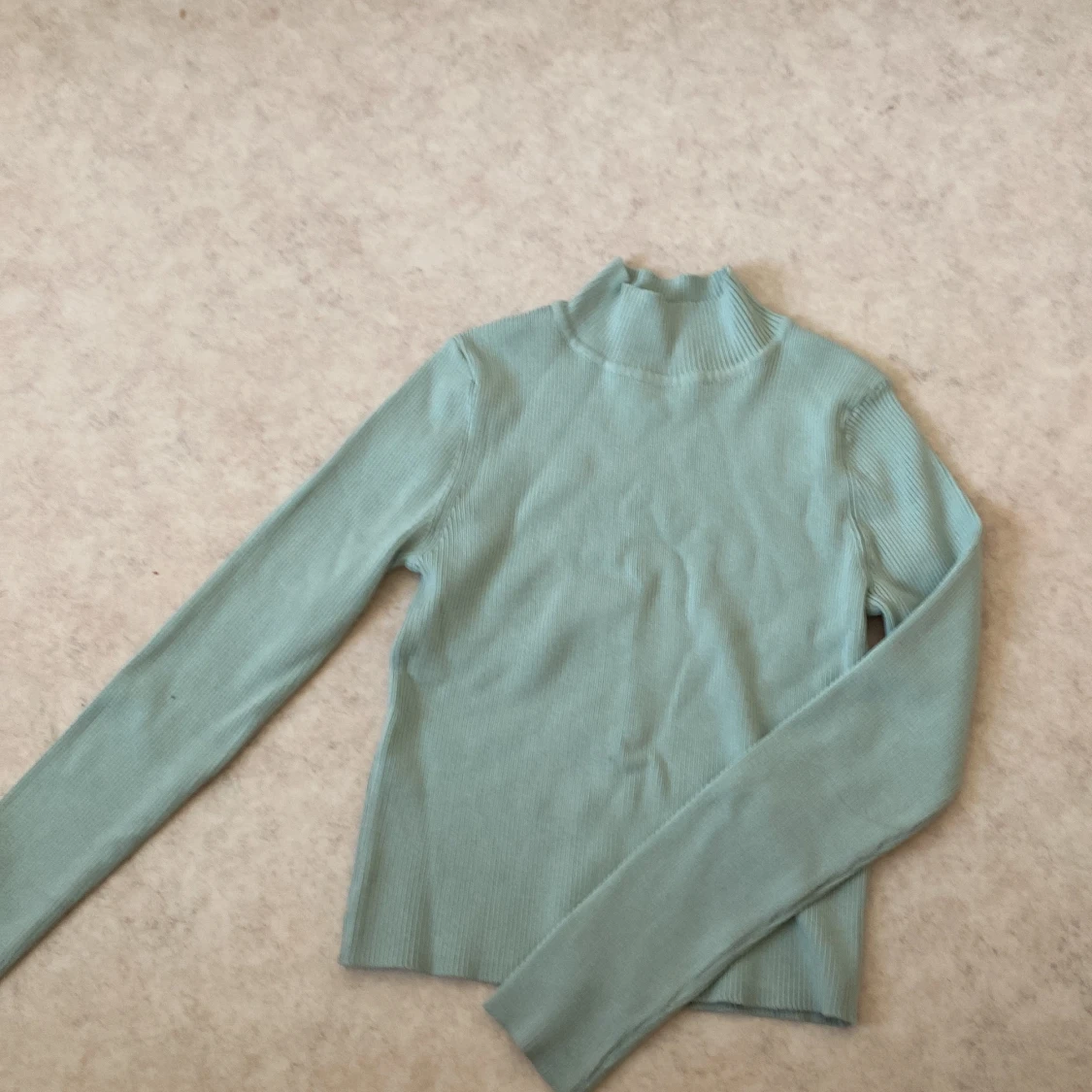 Ljusgrön polo tröja strl m