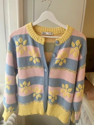 Button-up cardigan - Gently worn, in great condition! Comfortable thicker fabric, all buttons work perfectly.   Wonderful for a spring outfit!