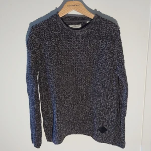 Produkt - Stickad tjocktröja 