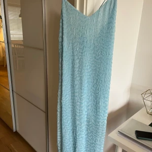 Fin babyblå klänning - Använd en gång på ett bröllop  Köpt för 2500kr 