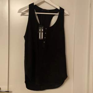 Diesel black gold lamb leather (picture 3) tank top. Has never been work the tag is still on. Comes with an extra button 