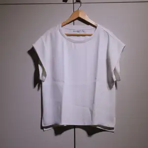 White top with wide, short sleeves fron Mango. In perfect condition. 