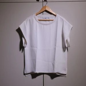 White top from Mango - White top with wide, short sleeves fron Mango. In perfect condition. 