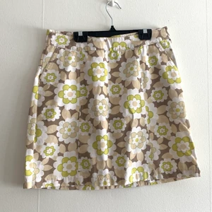 60tals kjol - 60-tals mini modkjol med blommigt mönster.