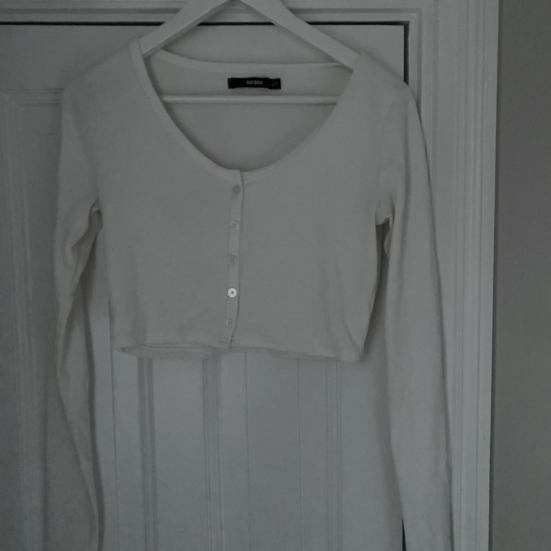 Vit långärmad tröja