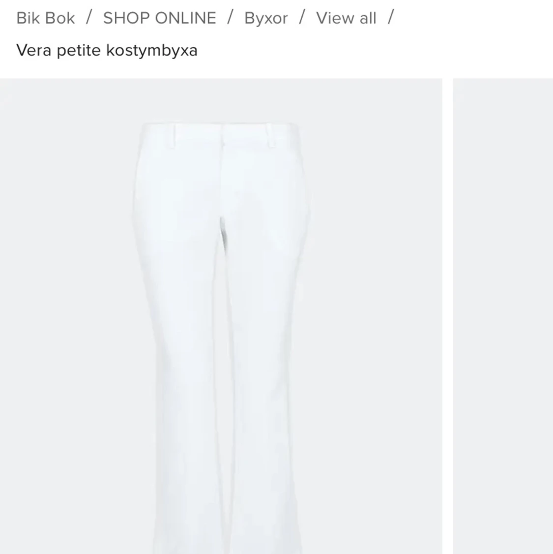 Lågmidjade vita kostymbyxor