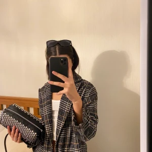 Snygg kappa - Rutig,snygg, varm kappa perfekt för det kalla vädret.