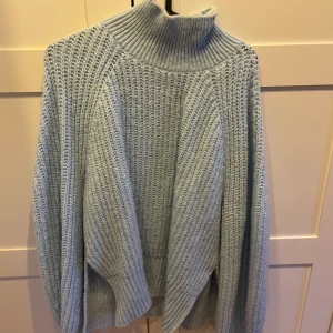 Tröja från LXA - En superfin blå stickad tröja från LXA. Knappt kommit till användning för min del så de är därför jag säljer den. Skicka för föer bilder eller funderingar