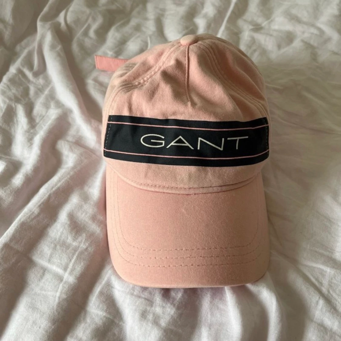 En rosa gantkeps  - 91