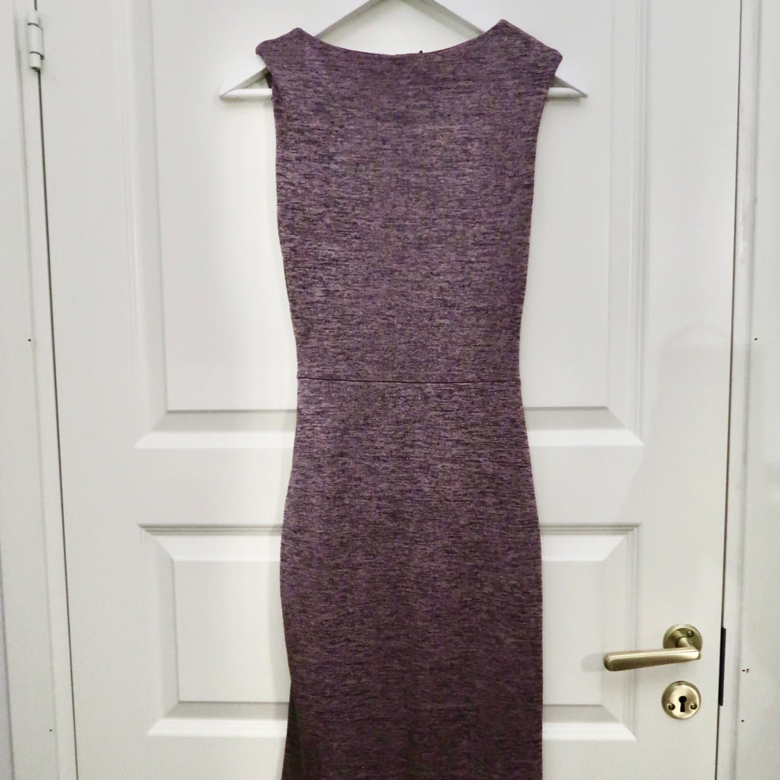 Skimrande klänning  - 91