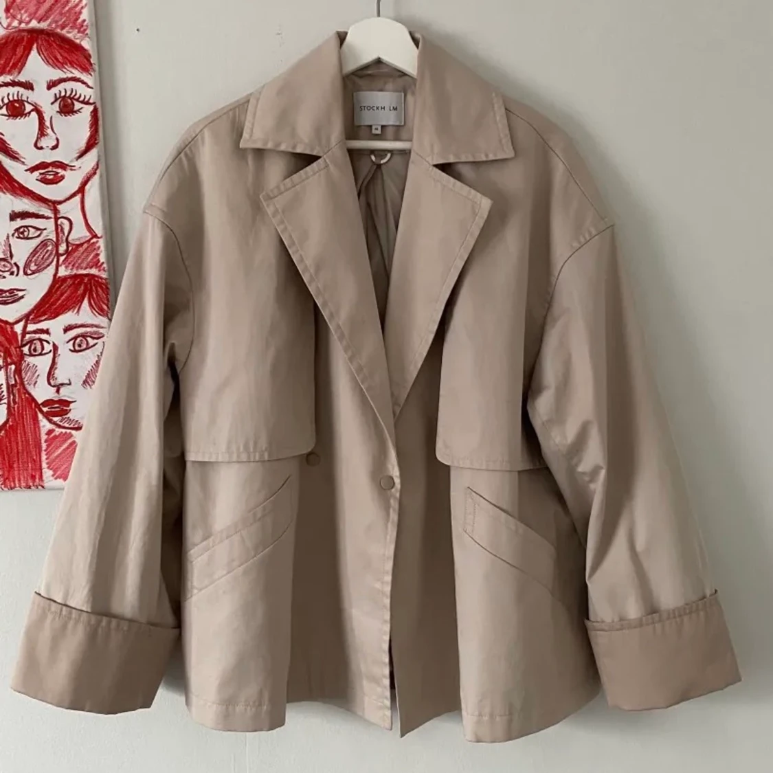 Kortare trenchcoat