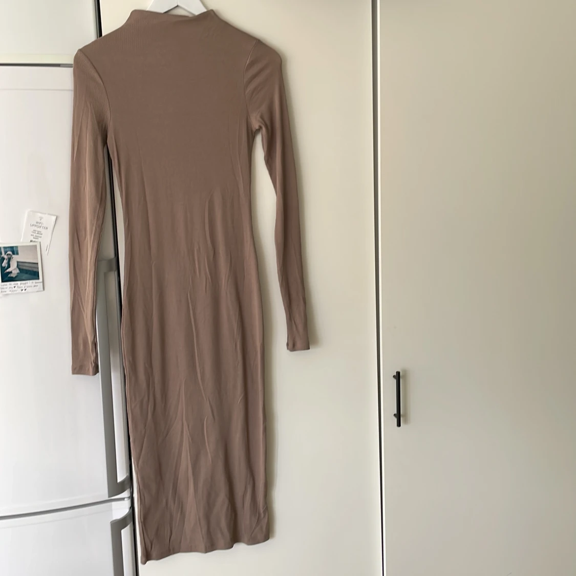 Lång figurnära klänming