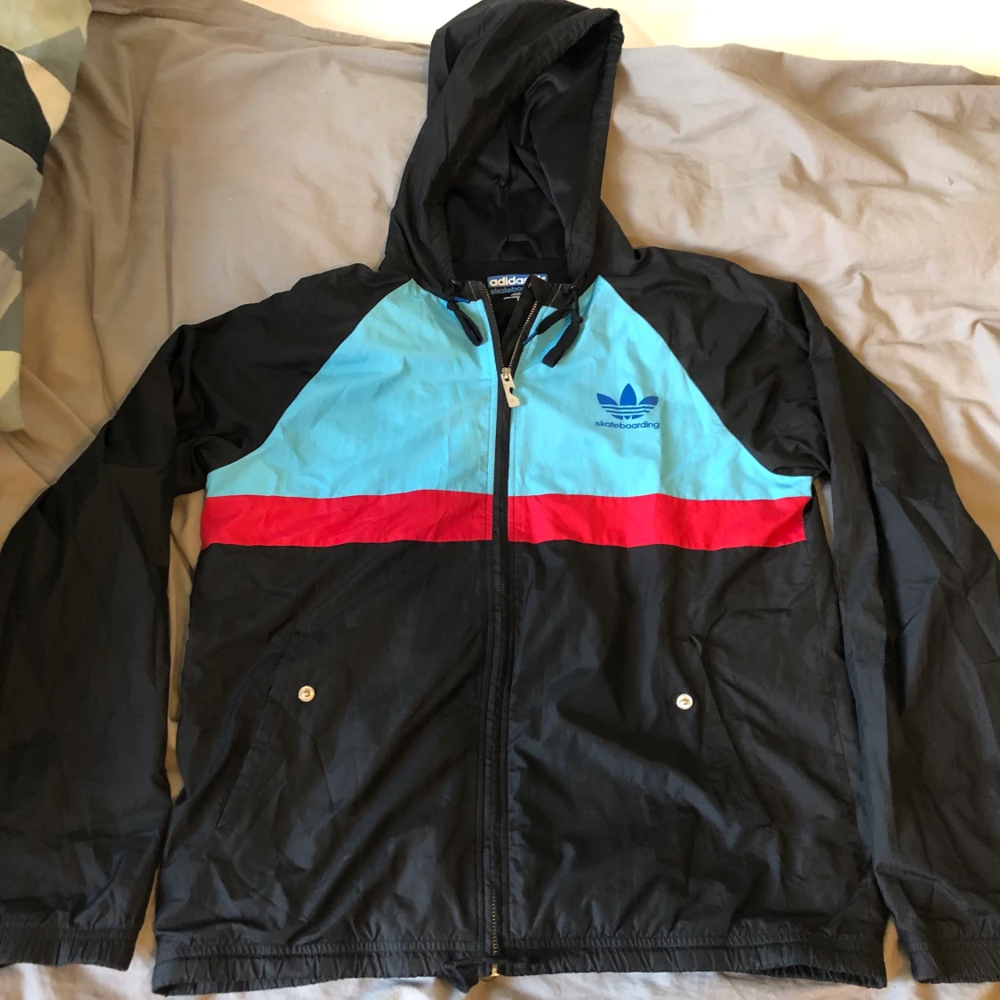 Adidas skateboarding windjacket size medium.
