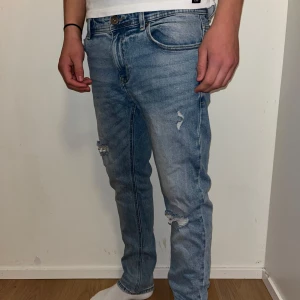 Light Blue Jeans - Ripped jeans in great condition. Has not been woren almost at all. Size waist 29 length 30. Ask for more information or pics if needed