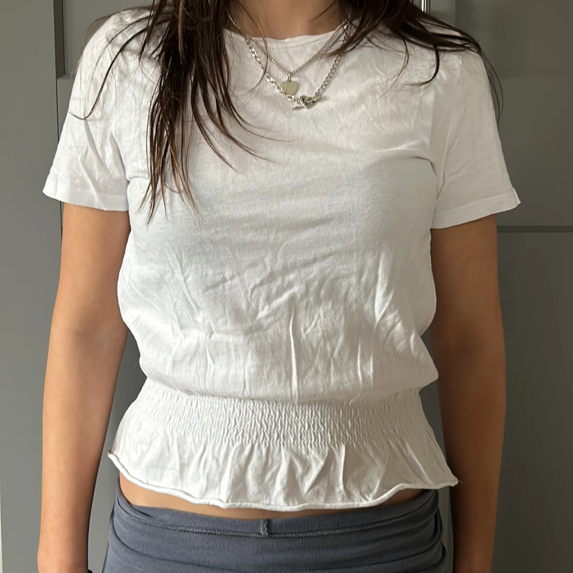 Vit kortärmad topp med resår