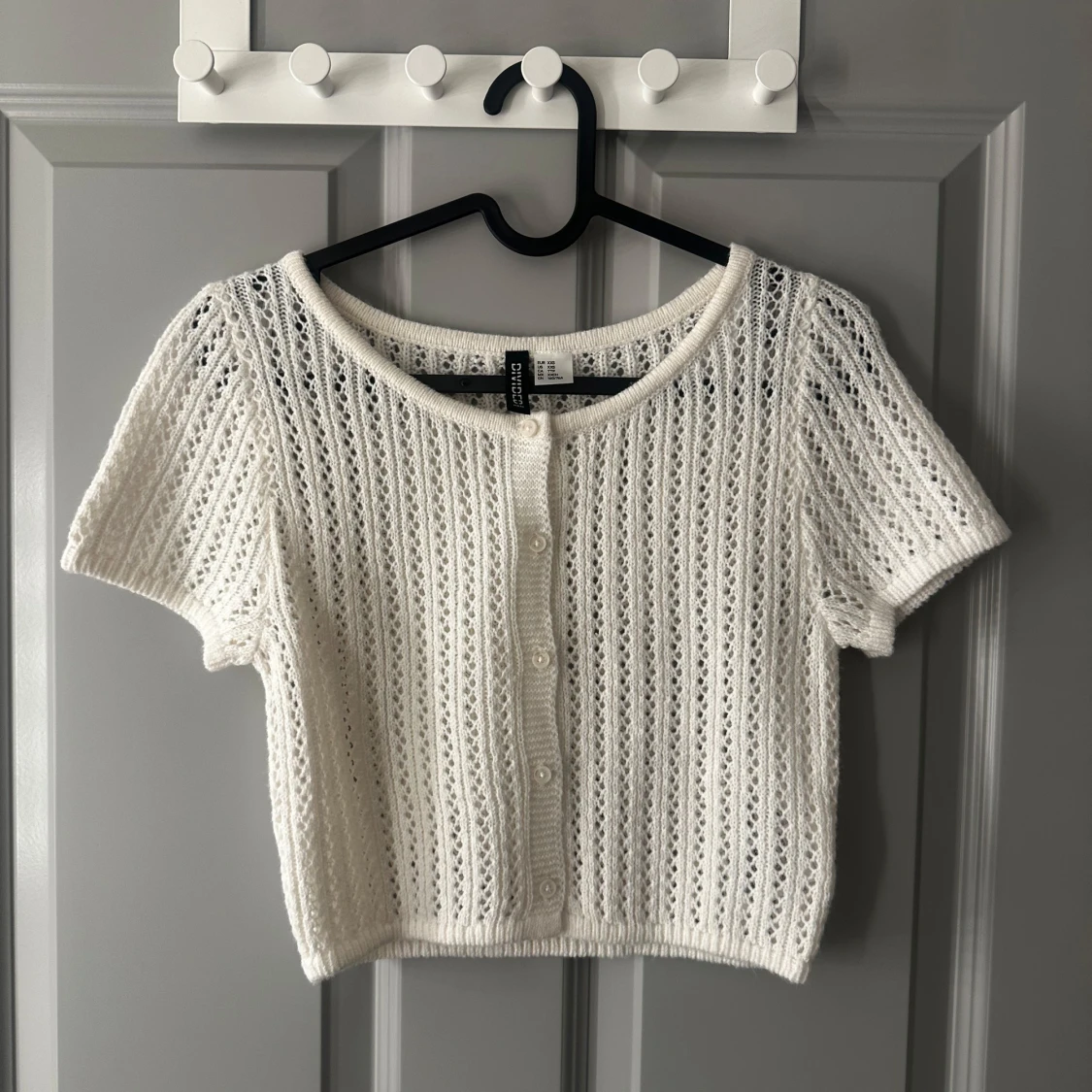 Vit stickad kortärmad topp från H&M