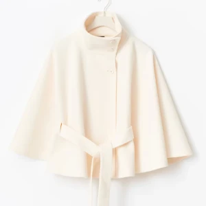 Gina belt cape jacket Xs/s - Xs/s, lappen sitter kvar,  beige kappa med hög krage och knappar framtill. Jackan har ett bälte i midjan. Slutsåld på hemsidan