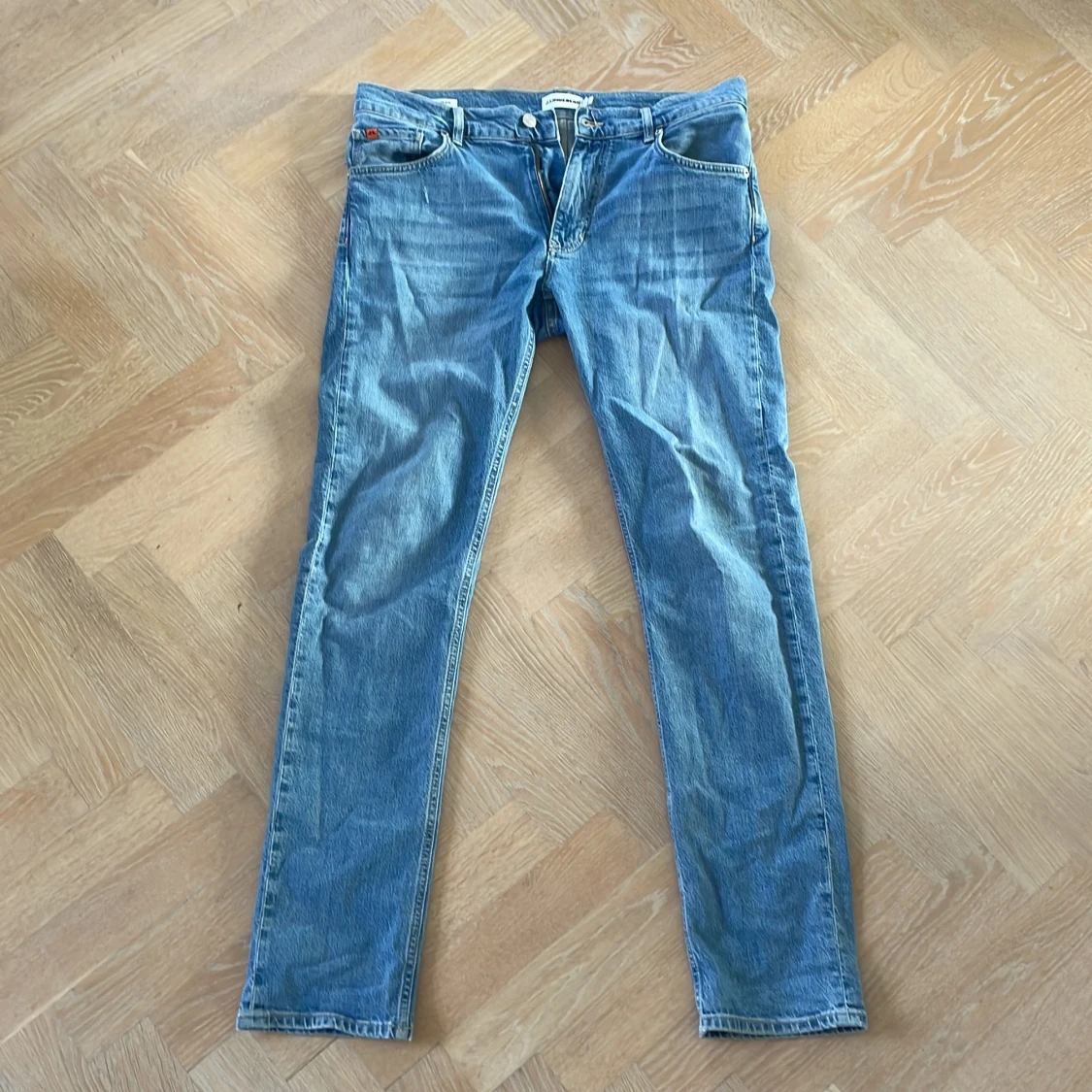 Blå slim fit jeans från J.Lindeberg