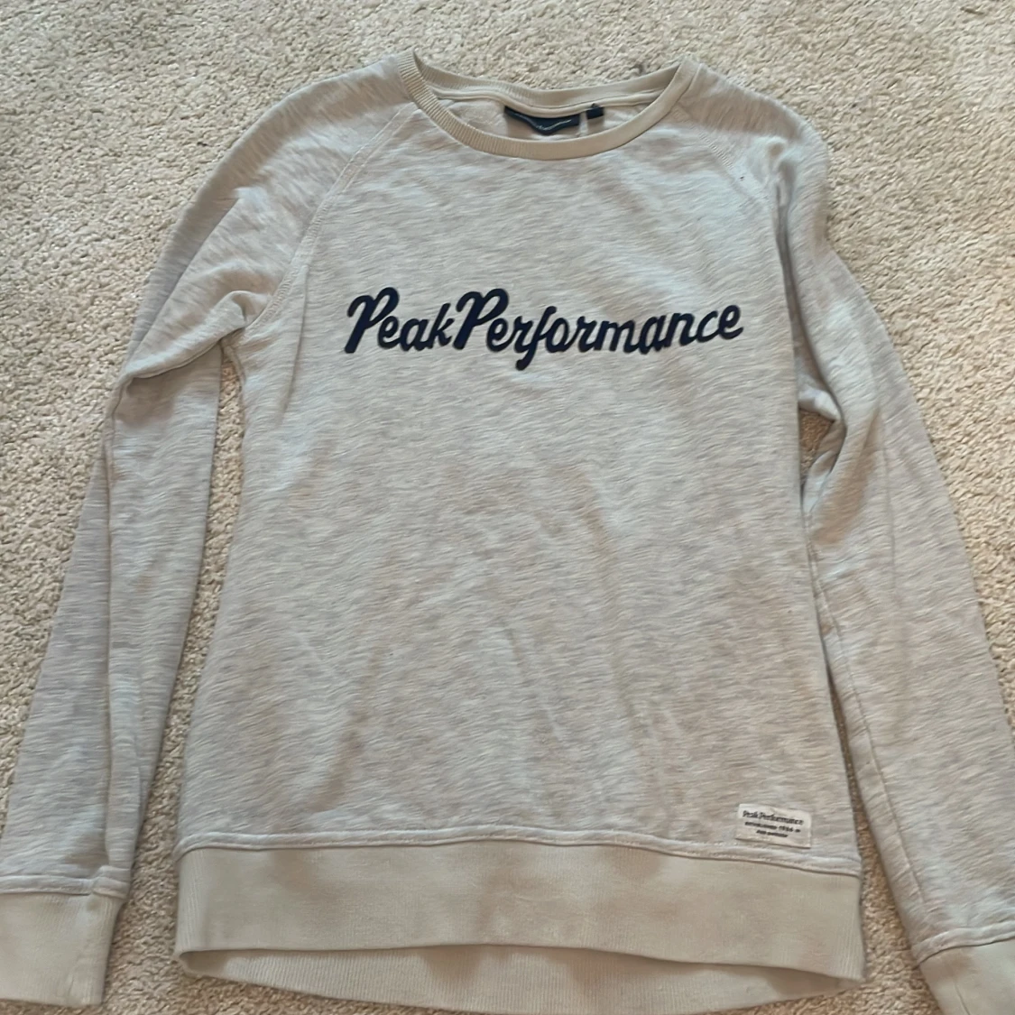 Beige tröja från Peak Performance