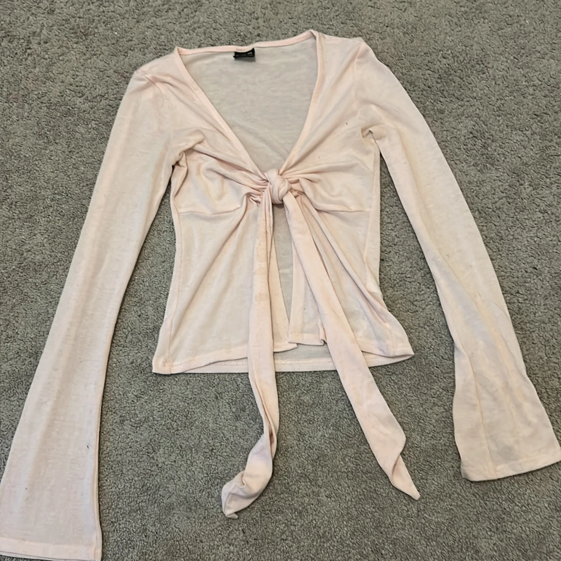 Ljusrosa knytblus från Gina Tricot