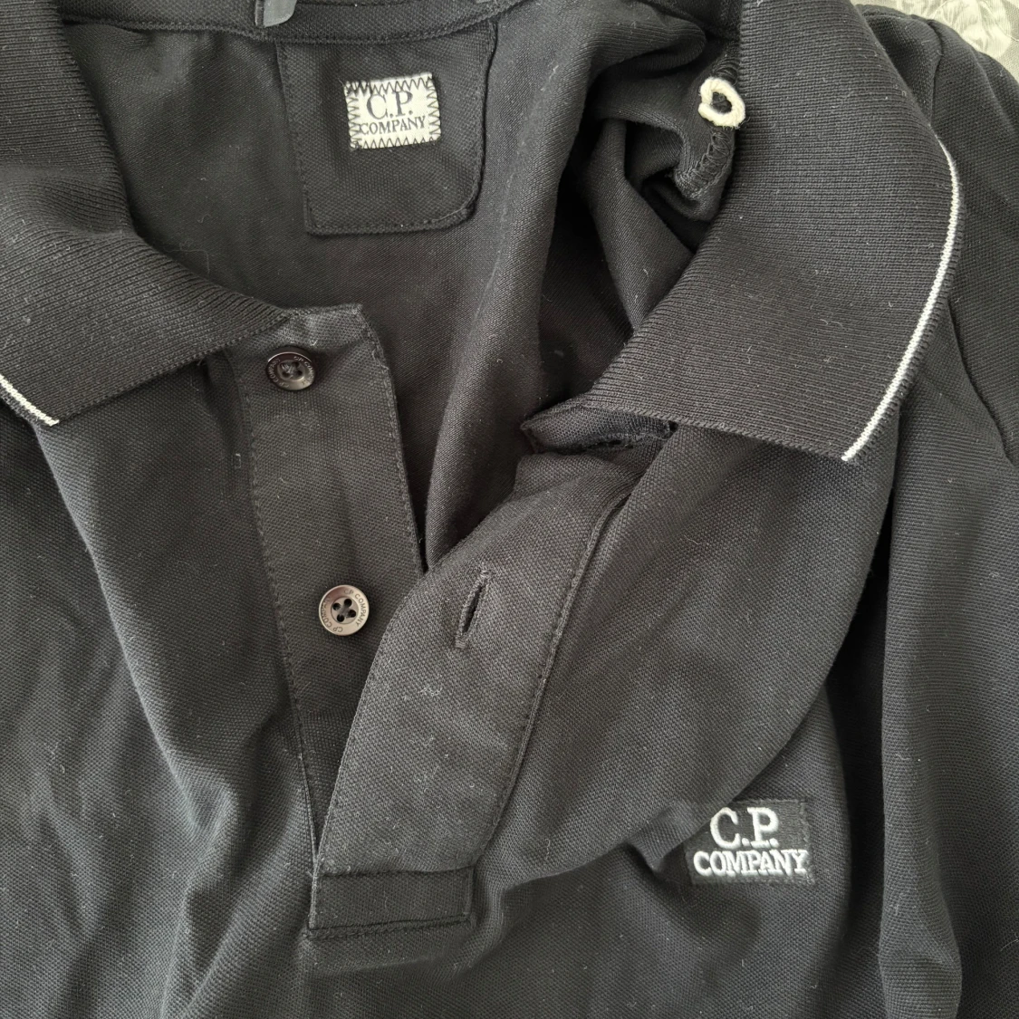 Svart pikétröja från C.P. Company - 2