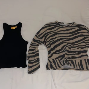 Tröjor - Jag säljer ett linne från Gina Tricot i storlek 146/152 och en tröja från Lindex i storlek 134/140. BÅDA för 40 kronor 💕✨