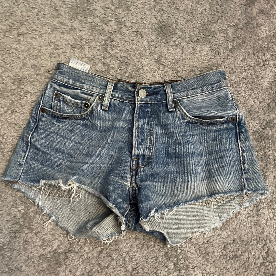 Blå jeansshorts med fransig kant - 1