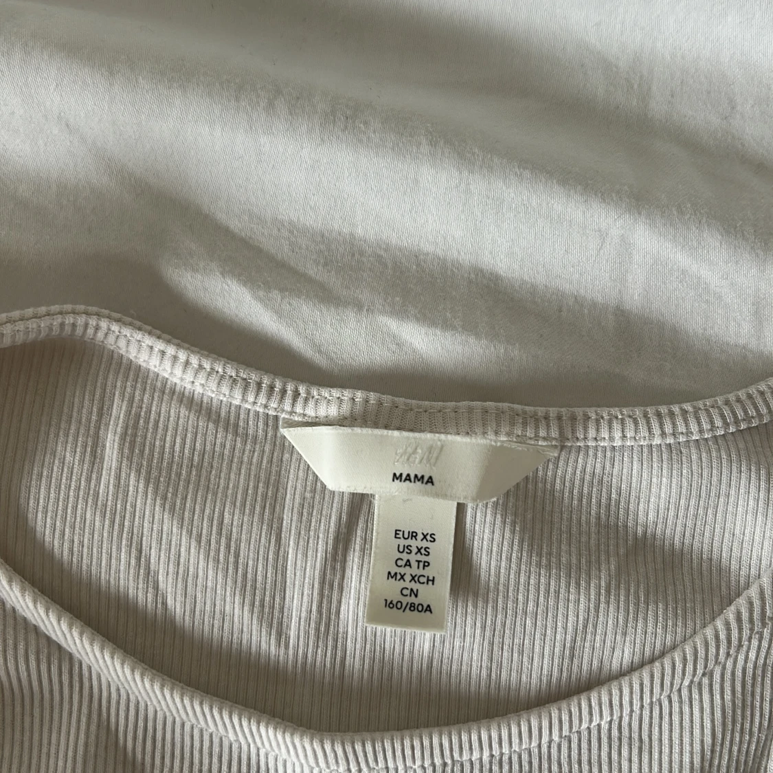 Beige ribbad topp med volangärm H&M - 1