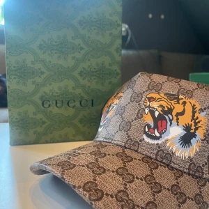 Tiger keps  - Har ni frågor är det bara att skriva