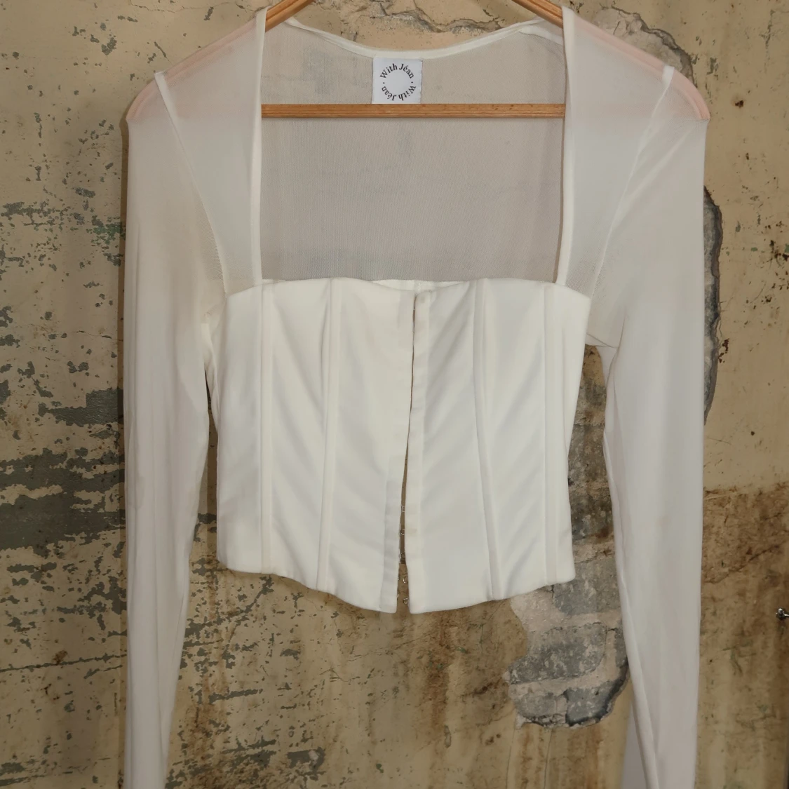 Vit långärmad mesh-korsett