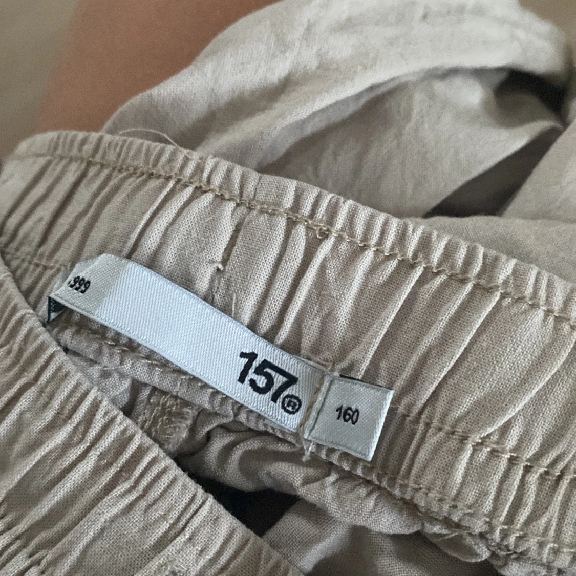Beiga linnebyxor från 157 - 2
