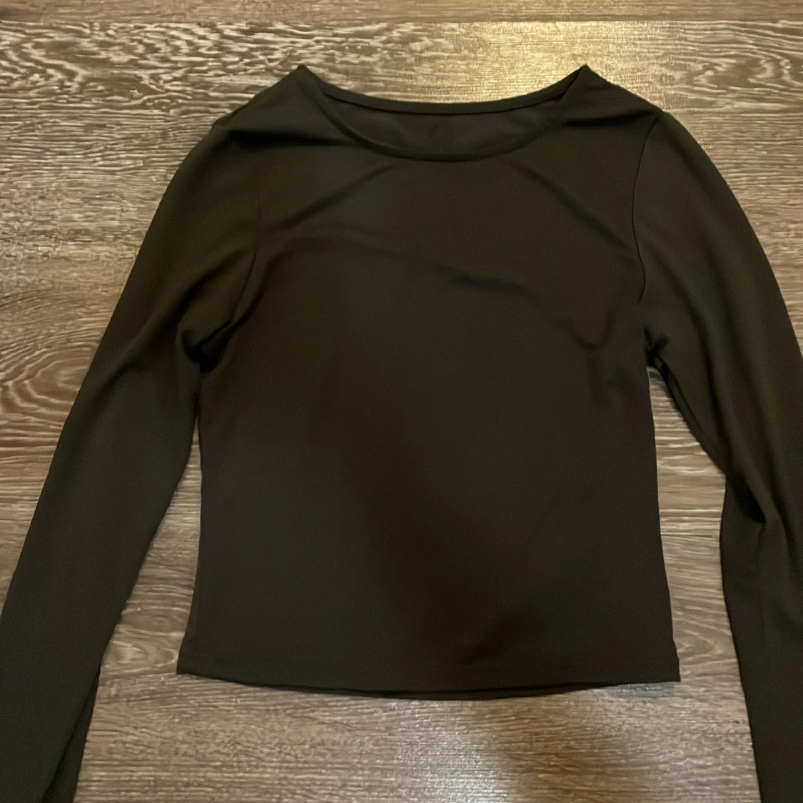 Svart långärmad topp i polyester