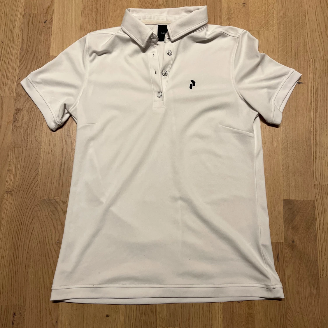 Vit Pikétröja från Peak Performance  - 1